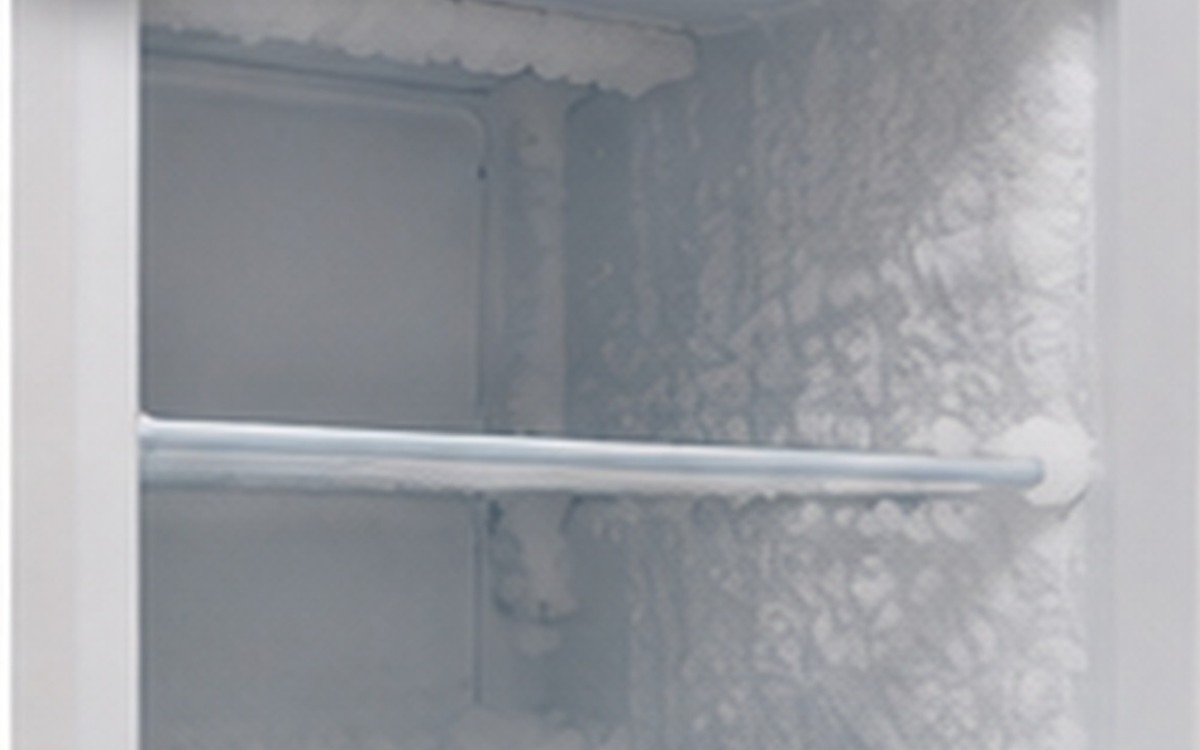 Close-up of frost buildup inside a freezer